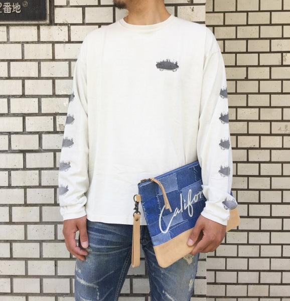 PATCHWORK JACQUARD DENIM CLUTCH BAG