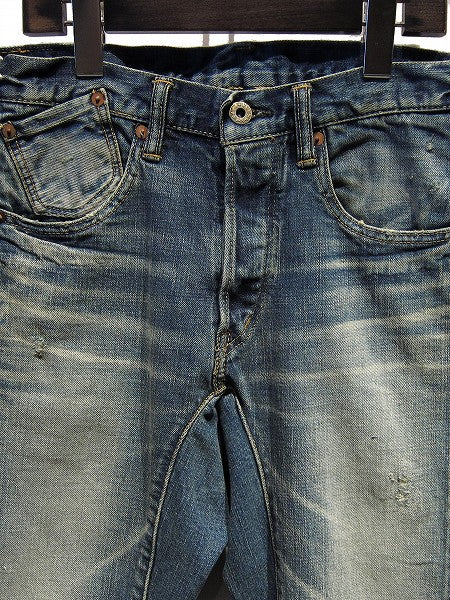 STRETCH TAPERED FIT JEAN DAMAGED REPAIRED