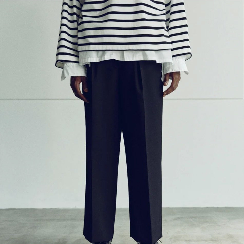 PURE BLACK WOOL GABERDINE 1-TUCK BAGGY SLACKS